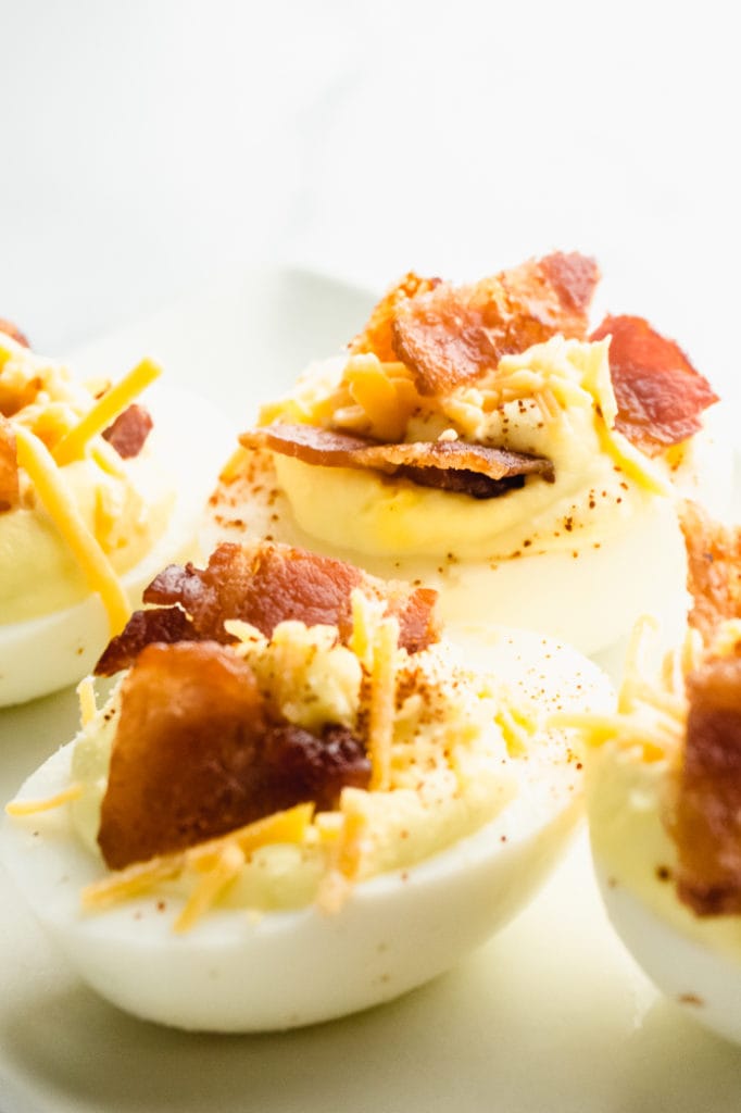 Loaded Keto Deviled Eggs with Cheddar and Bacon - Green and Keto