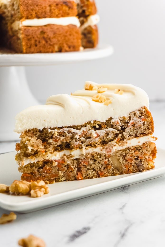 slice of keto carrot cake with cream cheese frosting
